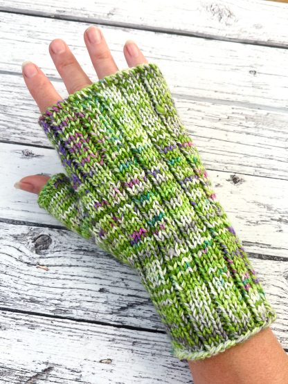 Knitted green merino fingerless gloves