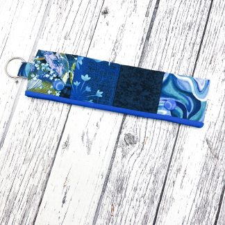 Patchworked dpn needle cosy
