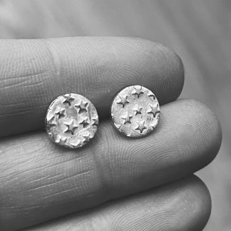Sterling silver star embossed stud earrings
